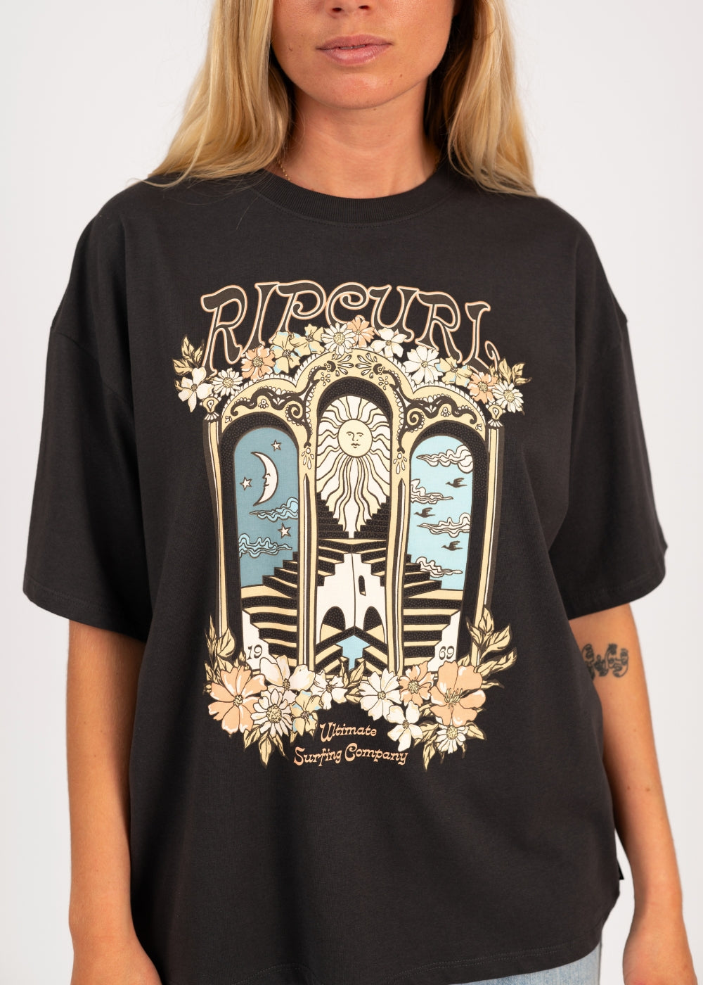 Tropical Tour Heritage Tee in Washed Black by Rip Curl