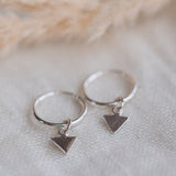 Silver Arrows Hoop Earrings by Catch The Sunrise