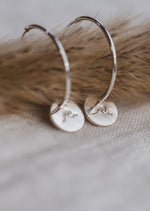 Silver Wave Charm Hoops by Catch The Sunrise