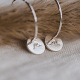 Silver Wave Charm Hoops by Catch The Sunrise