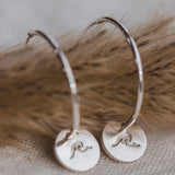 Silver Wave Charm Hoops by Catch The Sunrise