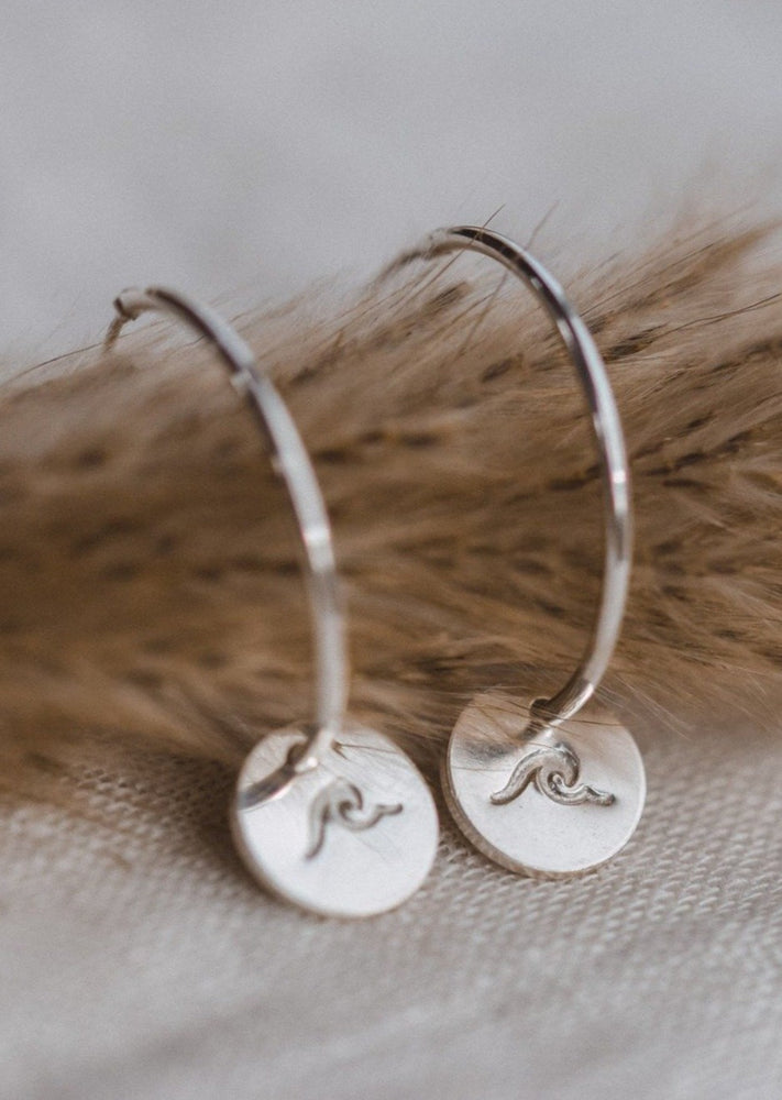Silver Wave Charm Hoops by Catch The Sunrise
