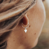 Silver Arrows Hoop Earrings by Catch The Sunrise