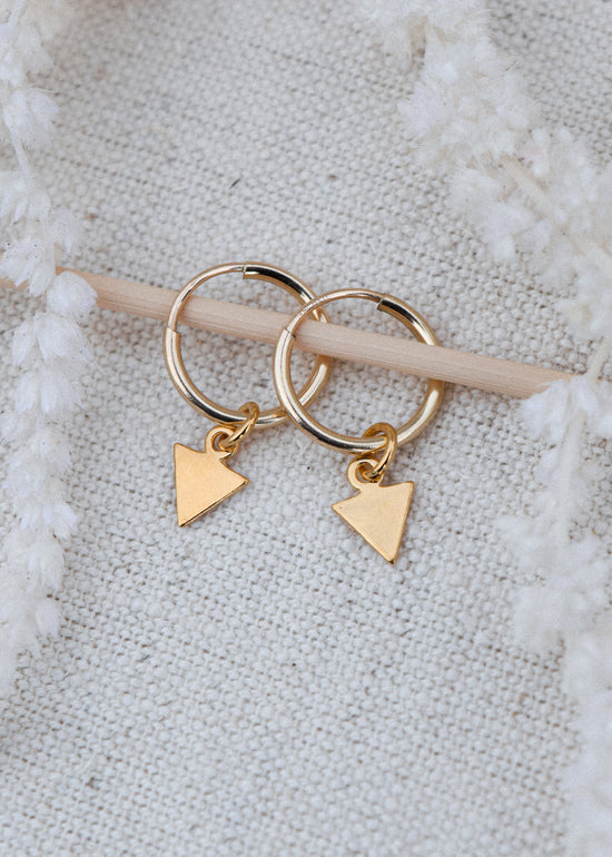 Gold Arrows Hoop Earrings by Catch The Sunrise